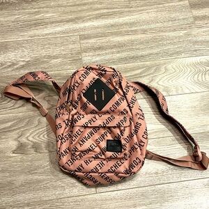 Hershel supply mini rose pink backpack